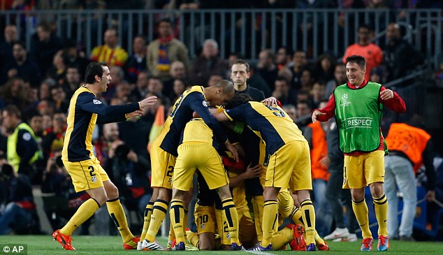 Away goal: Atletico players celebrate Diego